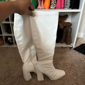White knee high boots